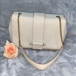 Cream colored chain purse